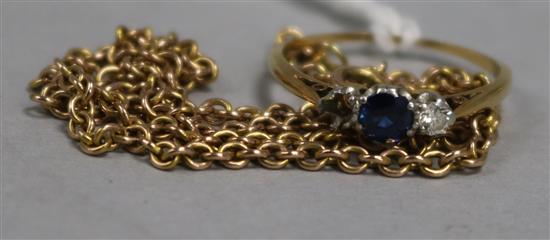 A three-stone sapphire and diamond ring, 18ct gold and platinum setting, and a 9ct gold fine chain,